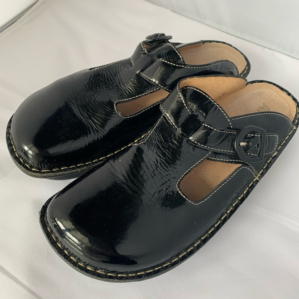 Algeria patent leather clogs